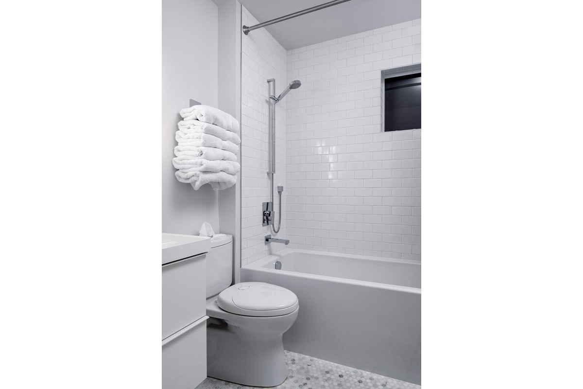 slider image of clean Bath bathroom example with surfaces protected with Microban antimicrobial technology